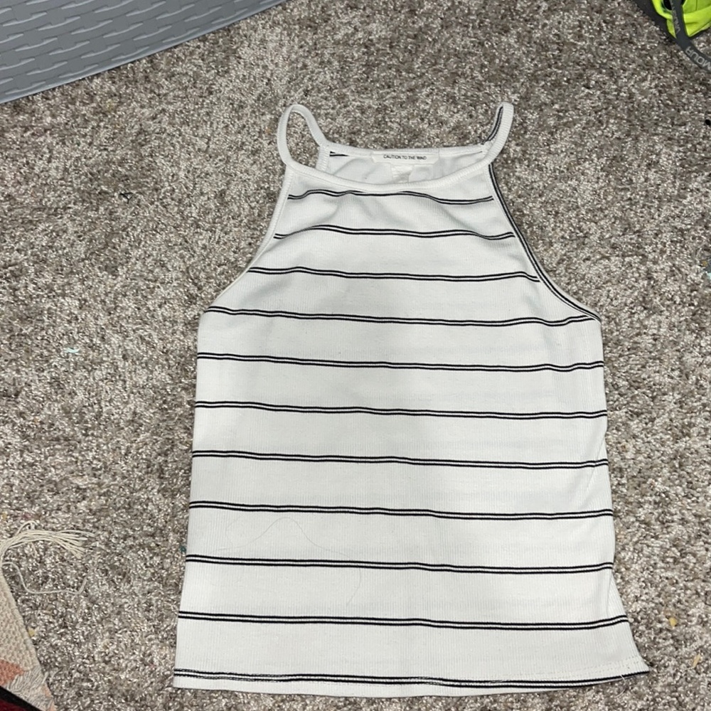 caution of the wind tank top